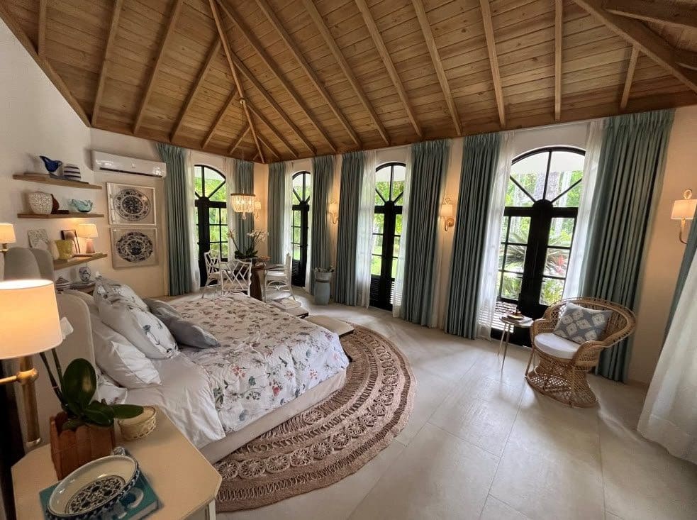 buyDRproperty Bedroom in Stunning Villa SUNSET with arched windows and wood ceiling. Sosua Real Estate