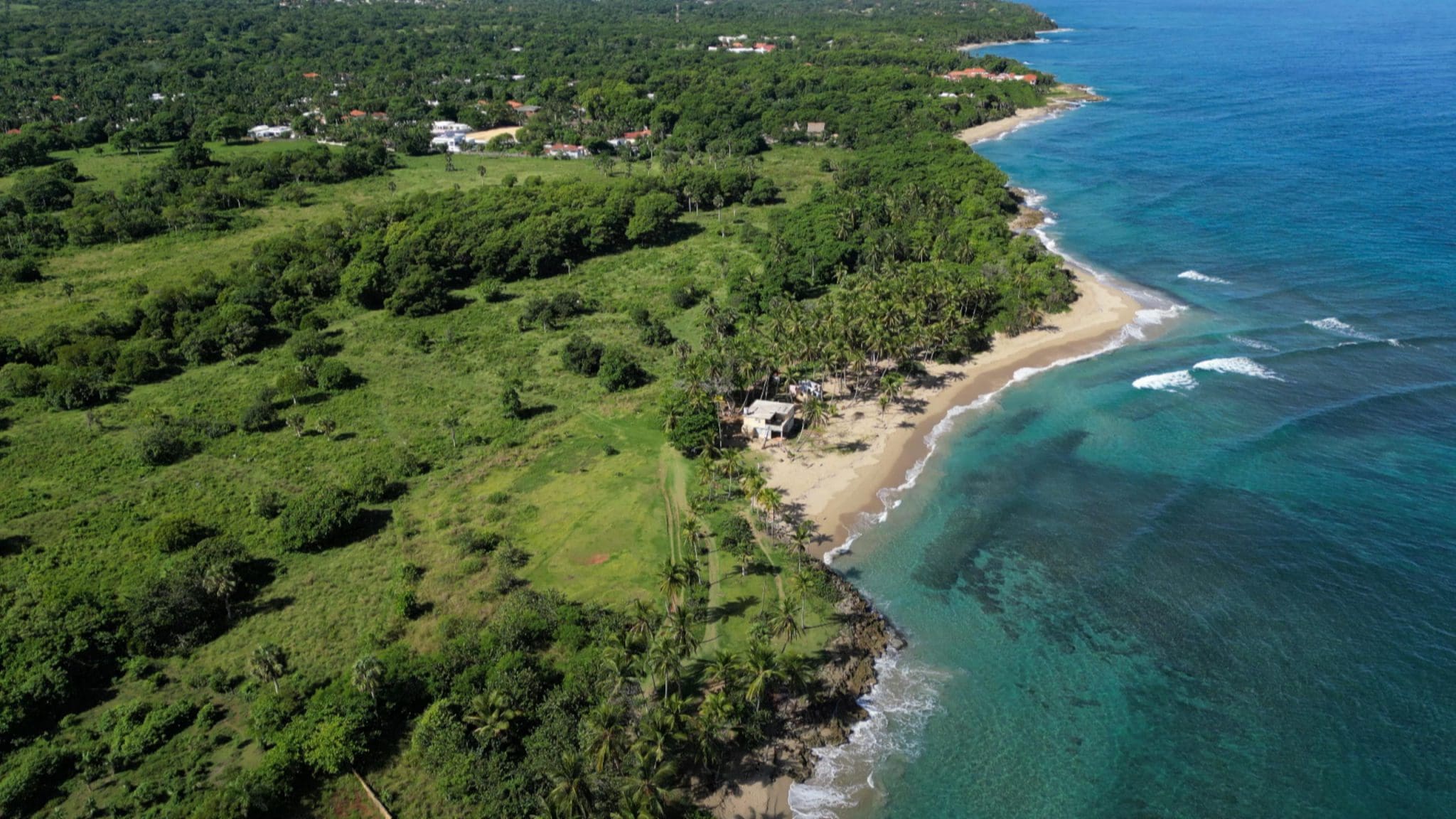 buyDRproperty Stunning oceanfront development property with beach and turquoise water Sosua Real Estate