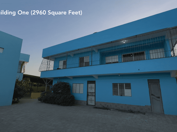 buyDRproperty Blue building, Building One (2960 Square Feet), for sale as a hostel business. Sosua Real Estate