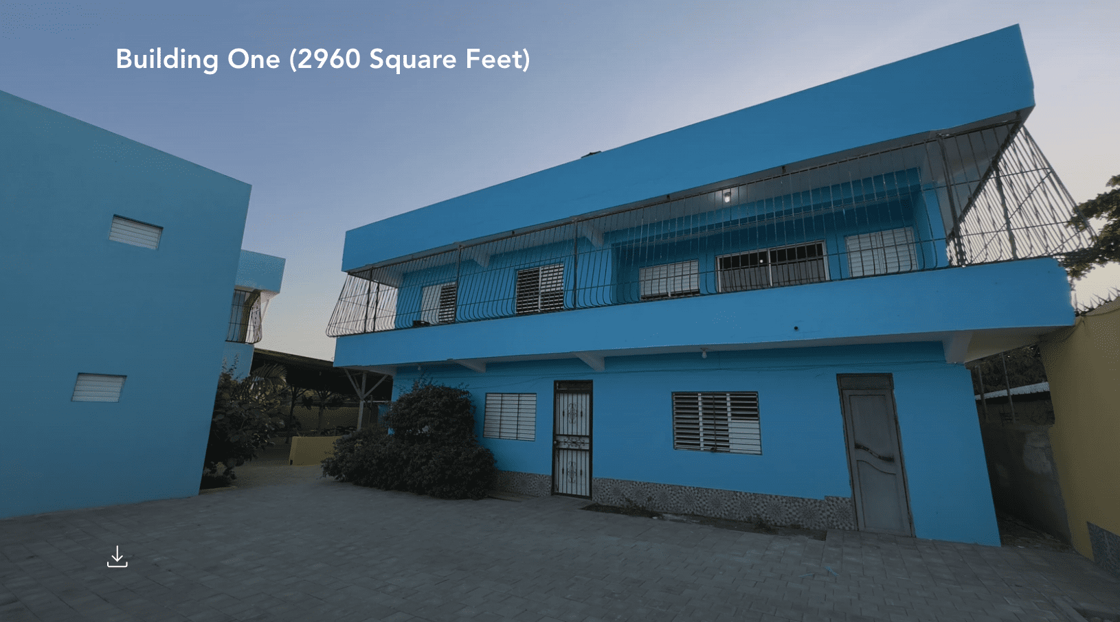 buyDRproperty Blue building, Building One (2960 Square Feet), for sale as a hostel business. Sosua Real Estate
