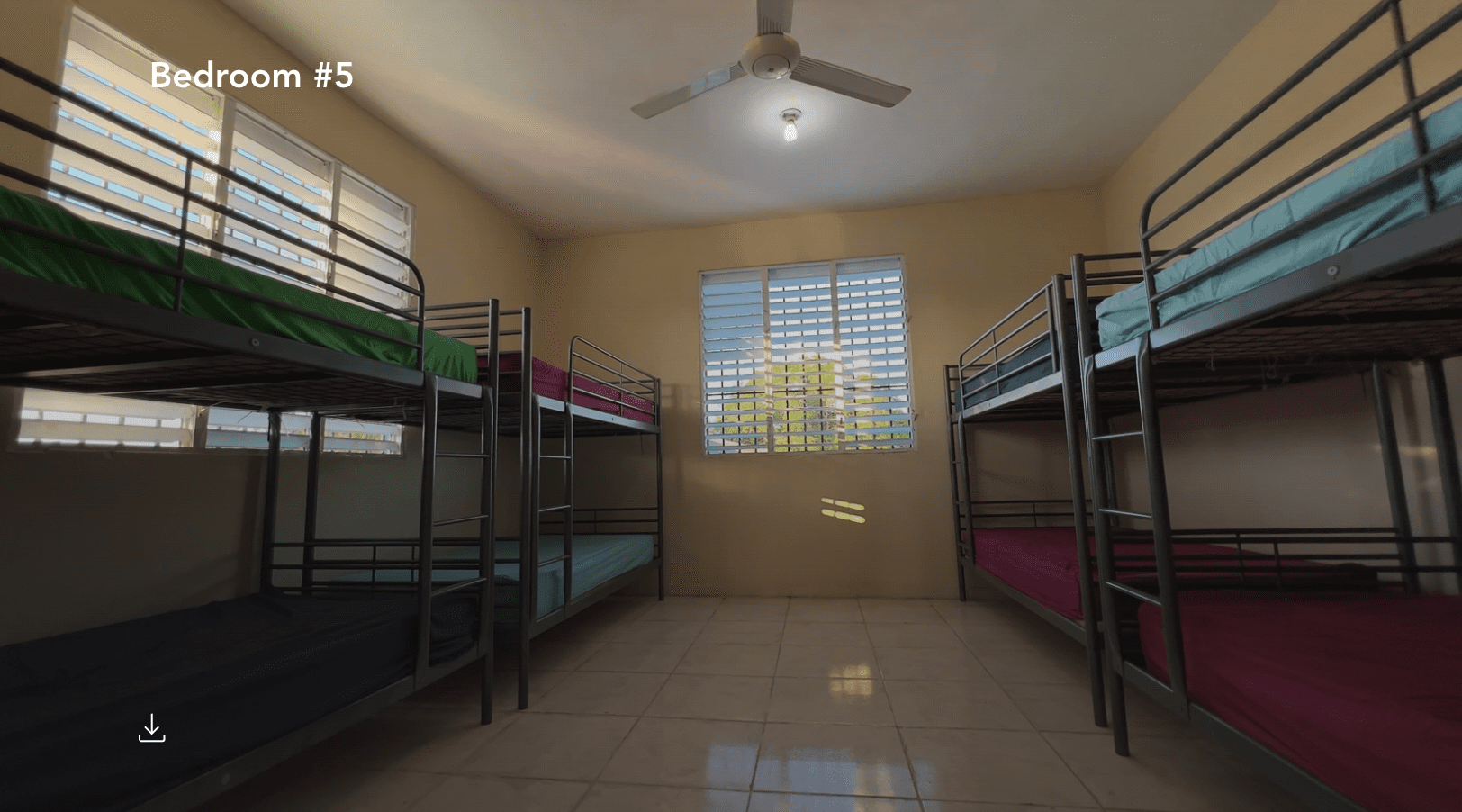 buyDRproperty Bedroom #5 in Hostel Business for Sale, featuring multiple bunk beds. Sosua Real Estate