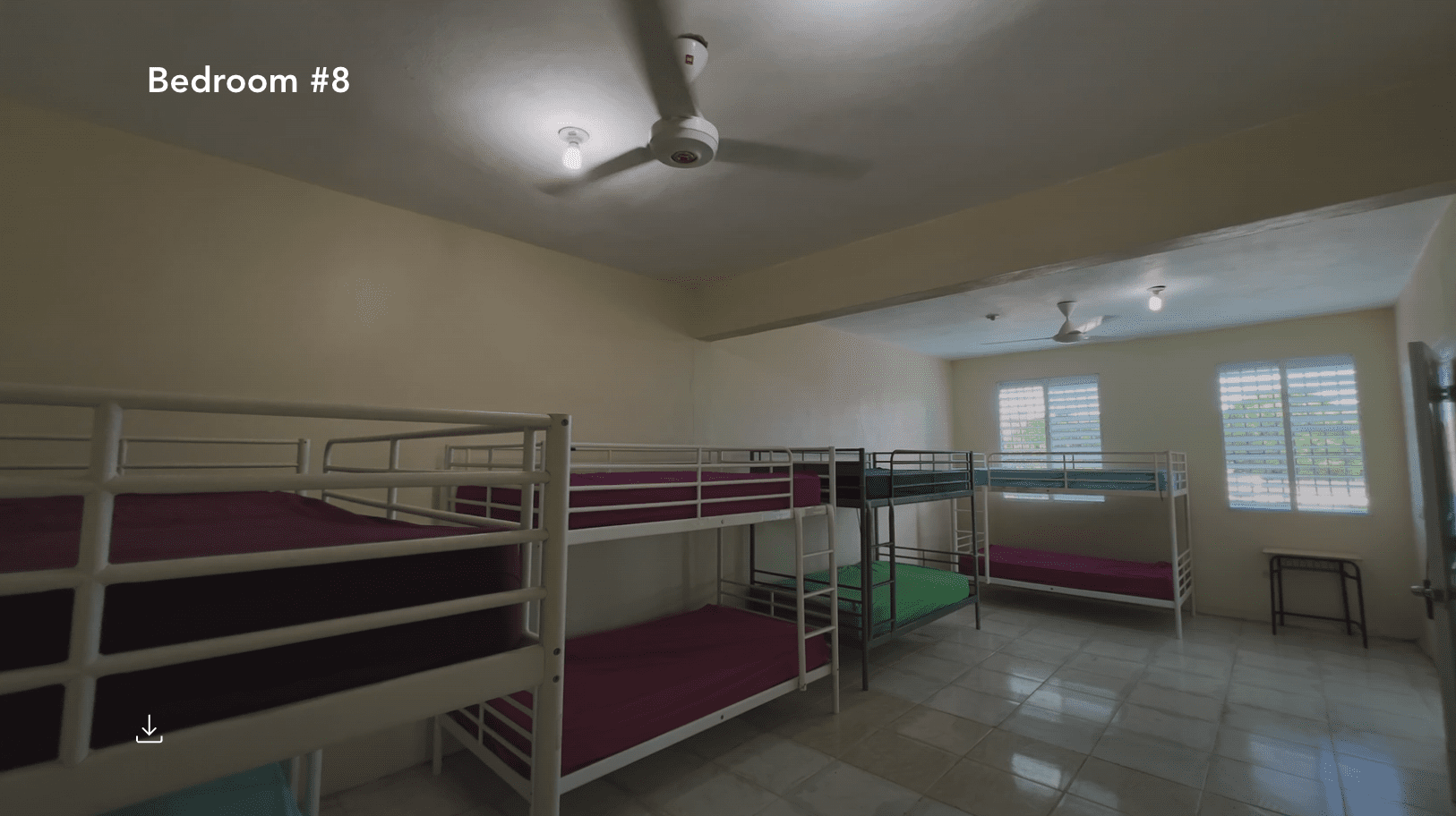 buyDRproperty Hostel room with multiple bunk beds, perfect for a hostel business. Sosua Real Estate