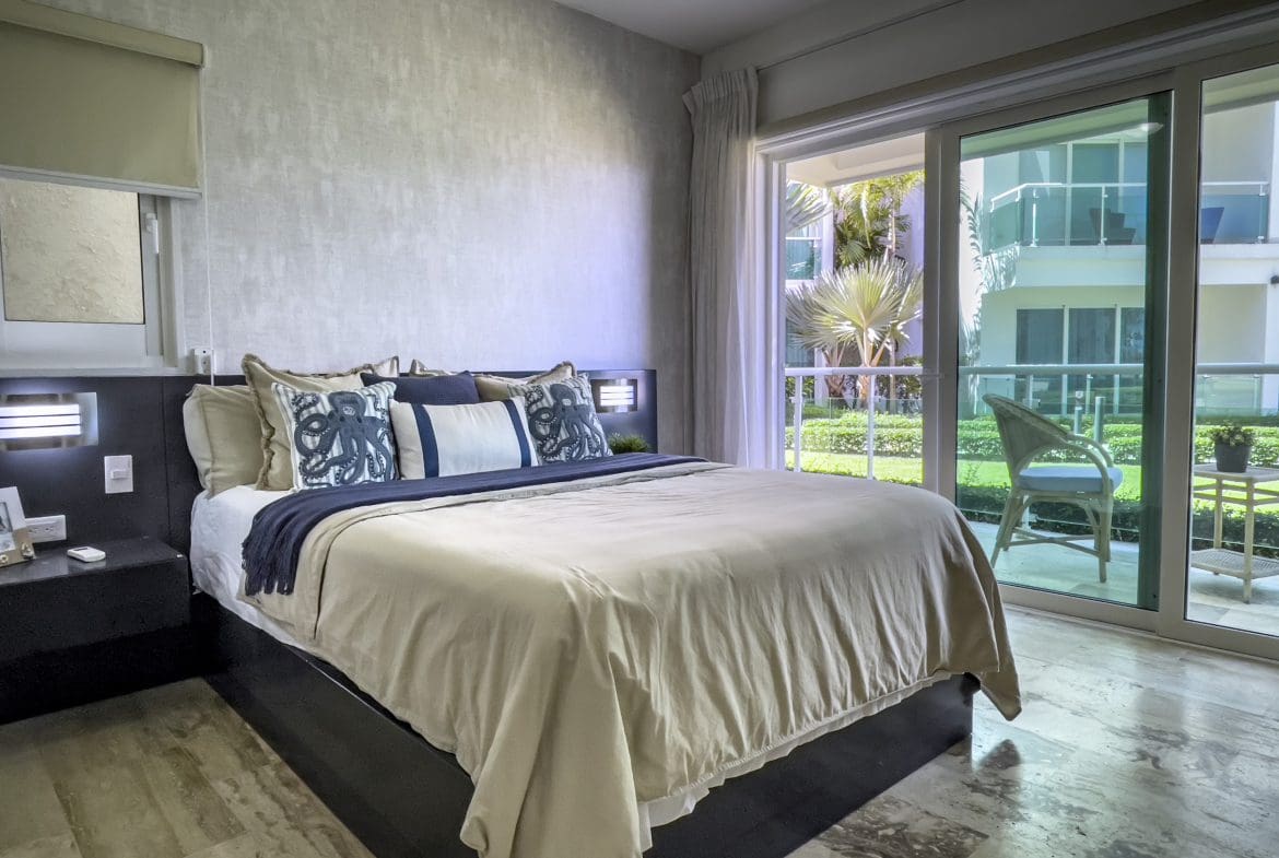 buyDRproperty Bedroom in a 3 Bedroom Oceanfront Condo with balcony view Sosua Real Estate