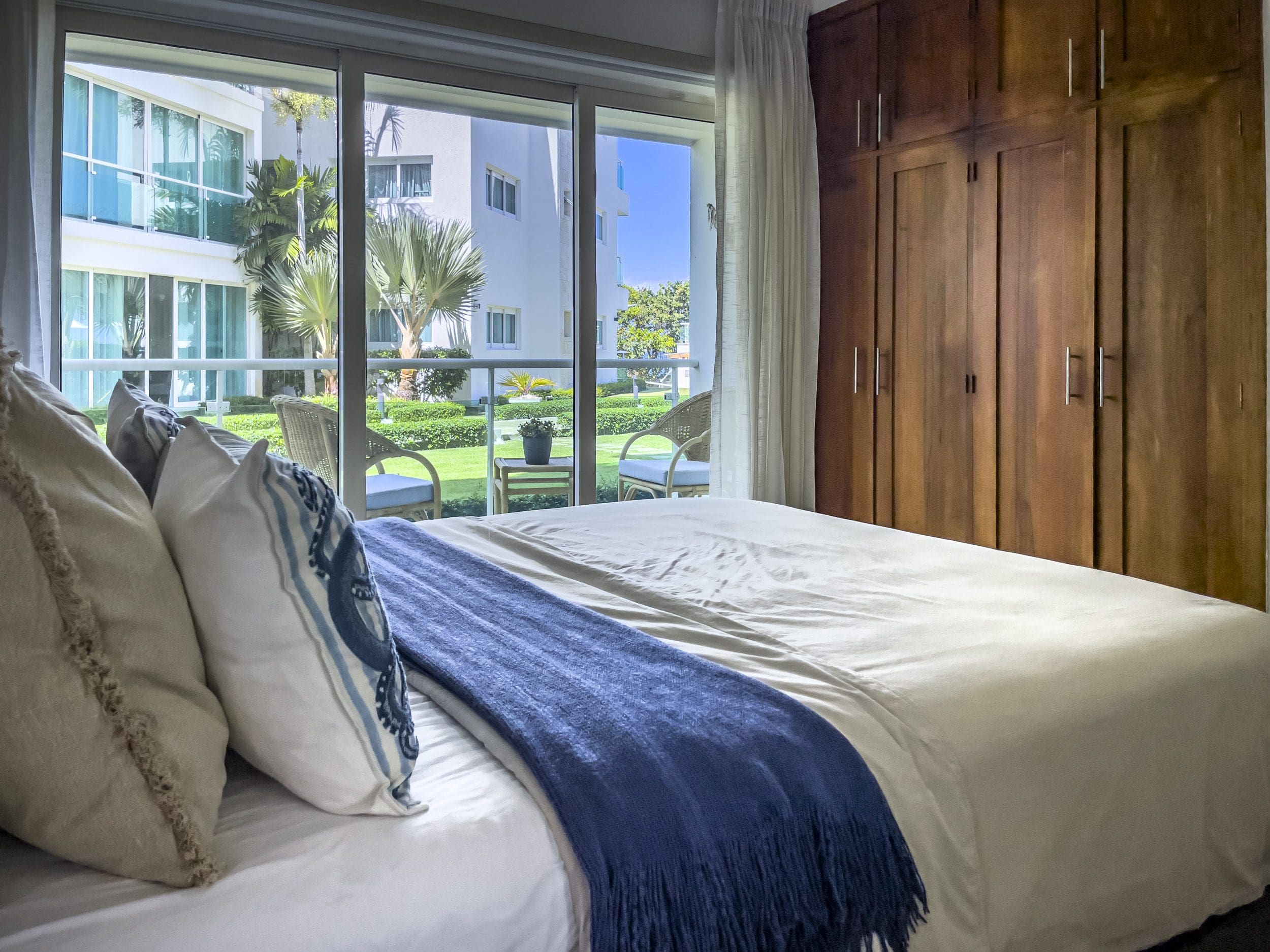 buyDRproperty Bedroom in a 3 Bedroom Oceanfront Condo with a view of the ocean. Sosua Real Estate