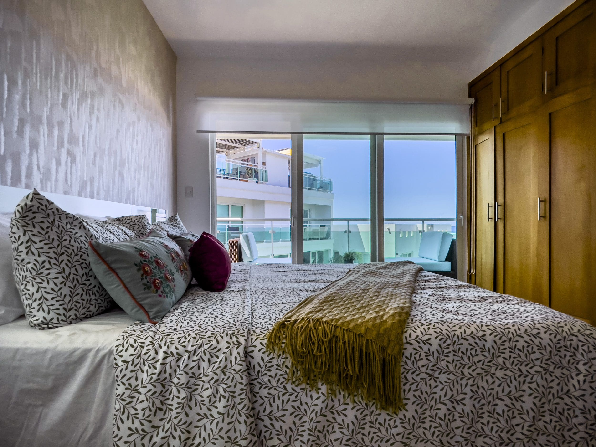 buyDRproperty Bedroom in an oceanfront condo for sale with a view of the ocean and balcony. Sosua Real Estate