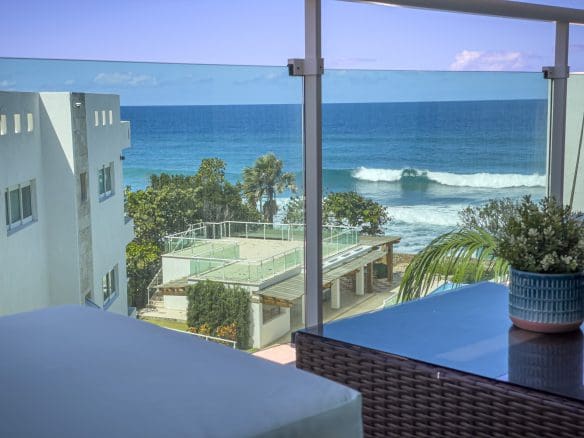 buyDRproperty Ocean view from a balcony, perfect for an oceanfront condo for sale. Sosua Real Estate