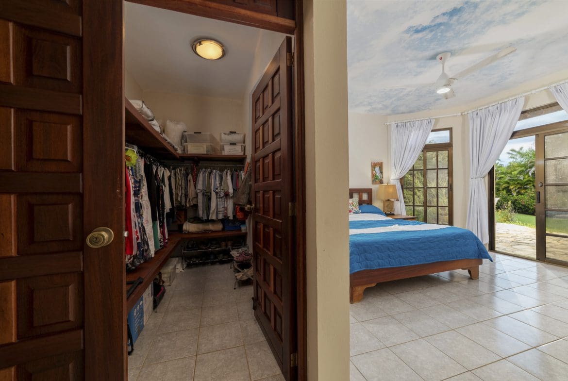 buyDRproperty Walk-in closet open to a bedroom in a beautiful villa Sosua Real Estate