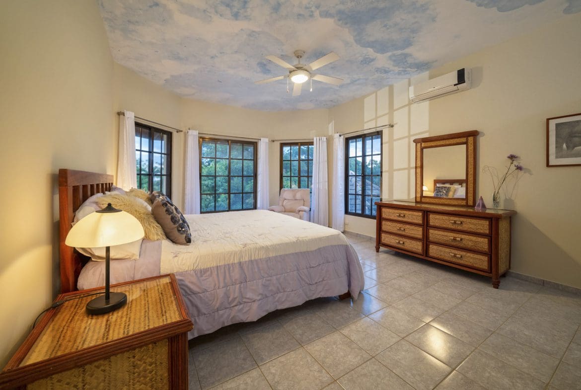 buyDRproperty Bedroom in a beautiful 4 bedroom villa in Sosua with cloud painted ceiling. Sosua Real Estate