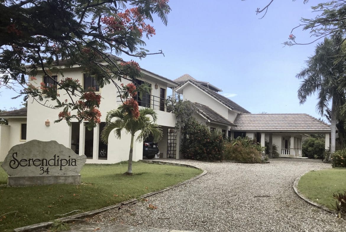 buyDRproperty Serendipia 34, a beautiful 4 bedroom villa in Sosua, Dominican Republic. Paved driveway leads to the house. Sosua Real Estate