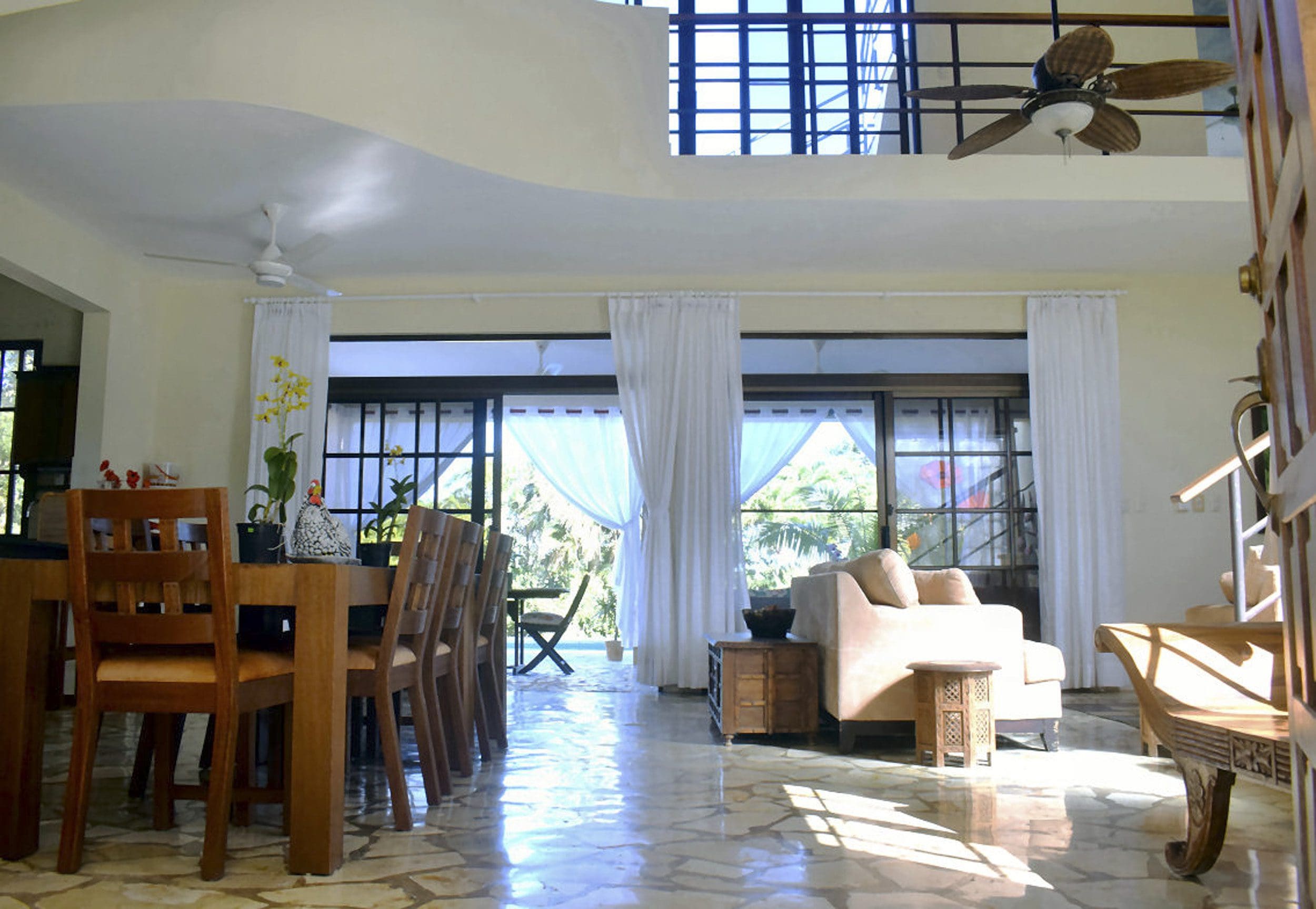 buyDRproperty Spacious living area in a Beautiful 4 Bedroom Villa For Sale in Sosua. Large windows with views. Sosua Real Estate