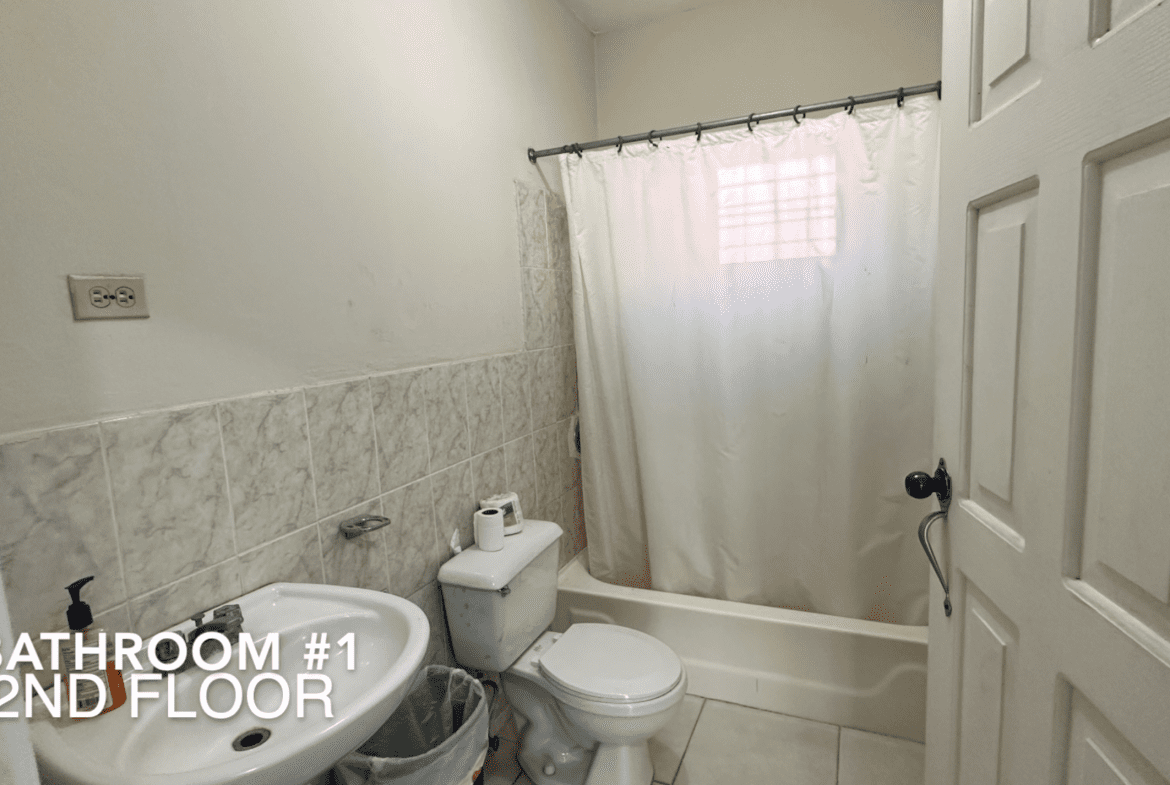 buyDRproperty Bathroom #1 on the 2nd floor of an affordable hotel facility. Sosua Real Estate