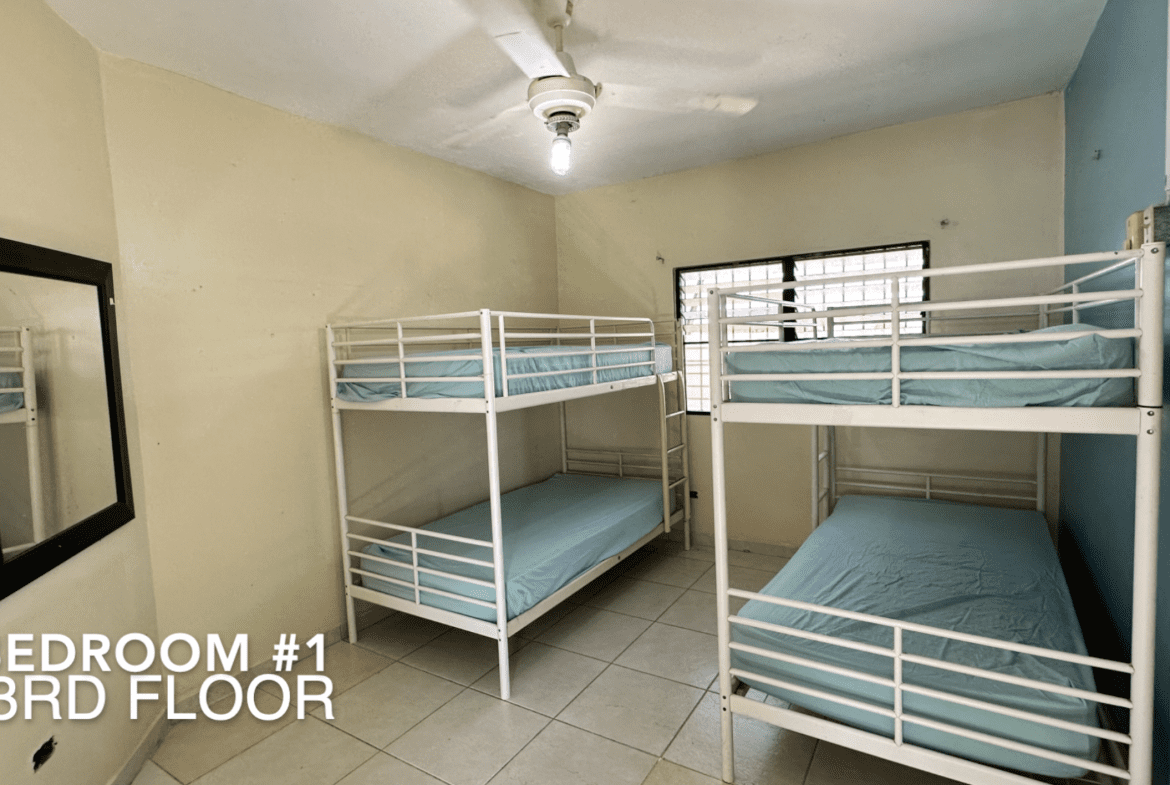 buyDRproperty Bedroom #1 on the 3rd floor with bunk beds. An affordable hotel facility. Sosua Real Estate