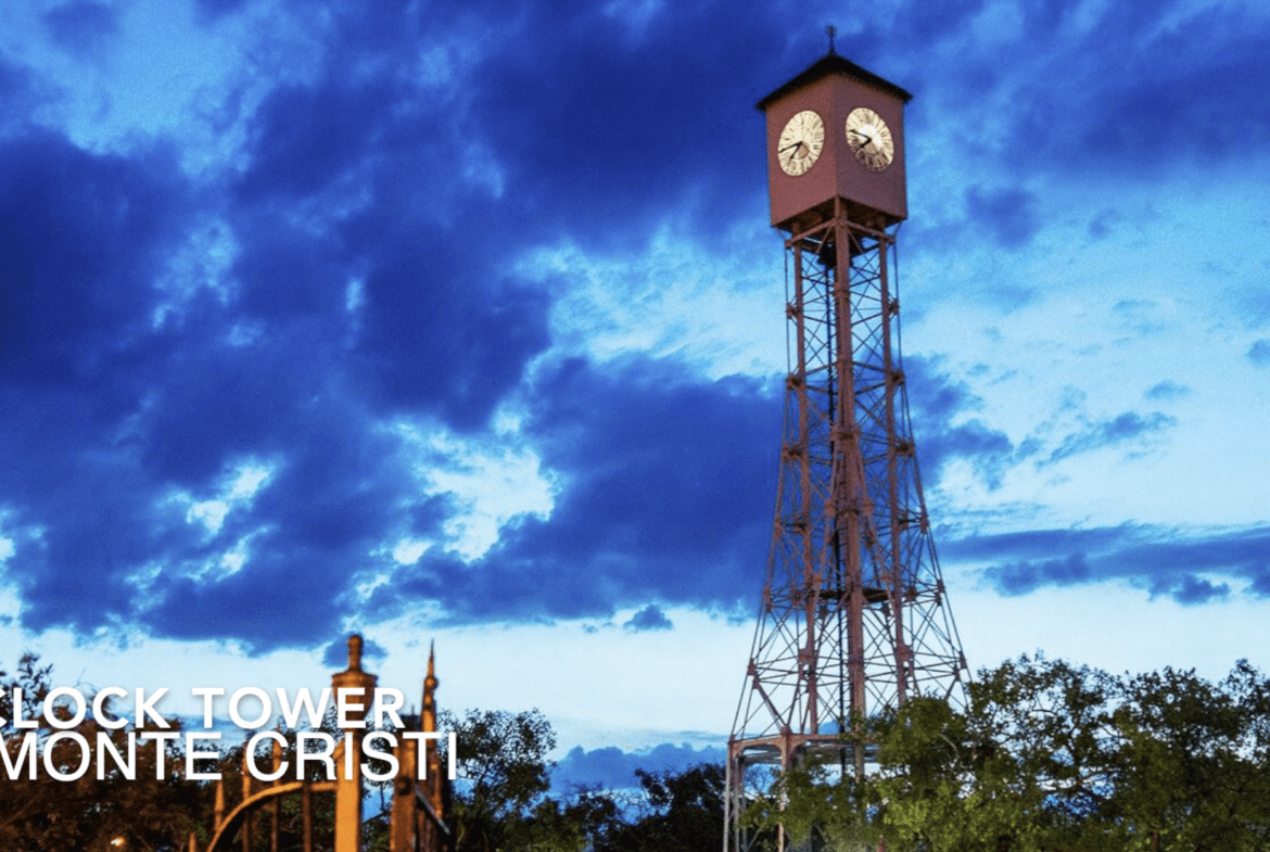 buyDRproperty Clock Tower Monte Cristi against a dramatic blue sky. Sosua Real Estate