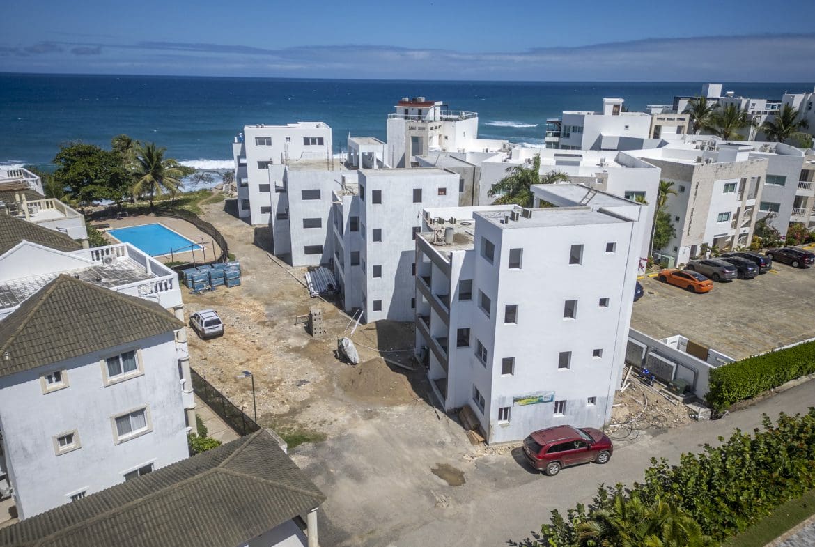 buyDRproperty Aerial view of oceanfront condos for sale in Sosua, Dominican Republic. Sosua Real Estate