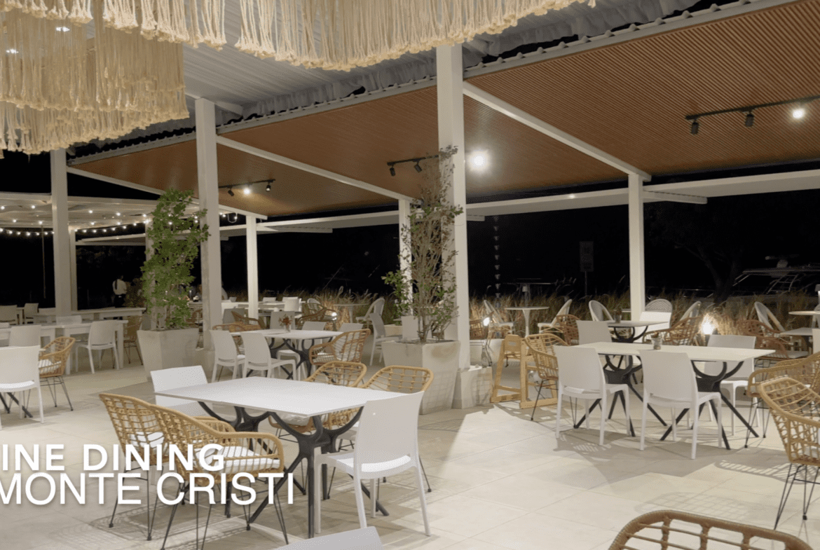 buyDRproperty Fine dining Monte Cristi restaurant with white tables and chairs. Affordable Hotel Facility. Sosua Real Estate