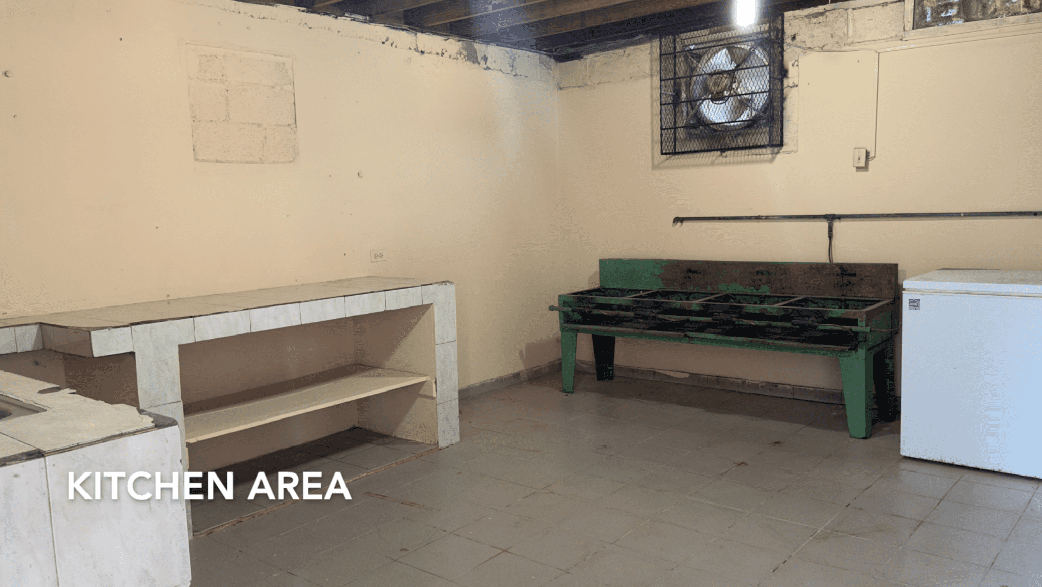 buyDRproperty Kitchen area in an affordable hotel facility for sale featuring a grill and freezer. Sosua Real Estate