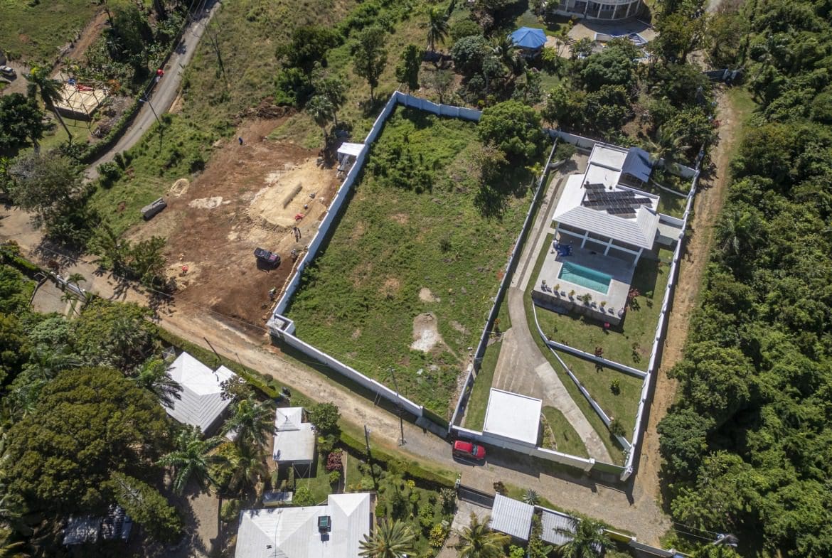 buyDRproperty Aerial view of lots for sale in La Mulata, one with a house and pool Sosua Real Estate