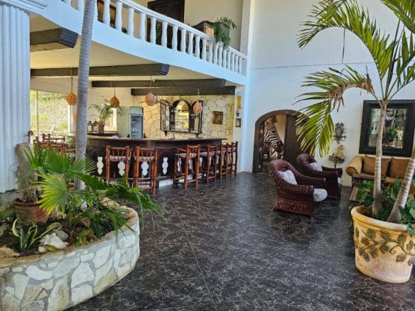 buyDRproperty Hotel bar and seating area near the beach, Playa Laguna Hotel Sosua Real Estate