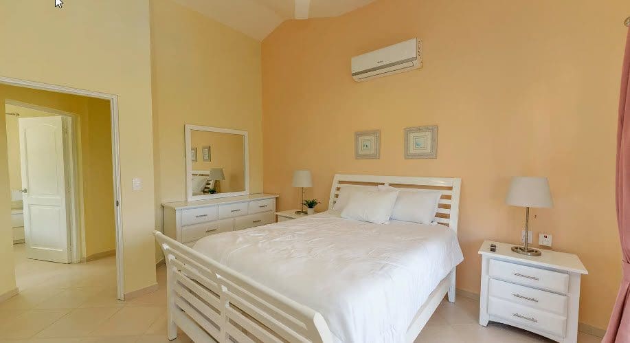 buyDRproperty Bedroom in Wonderful 3 Bedroom Villa with white bed and furniture. Sosua Real Estate