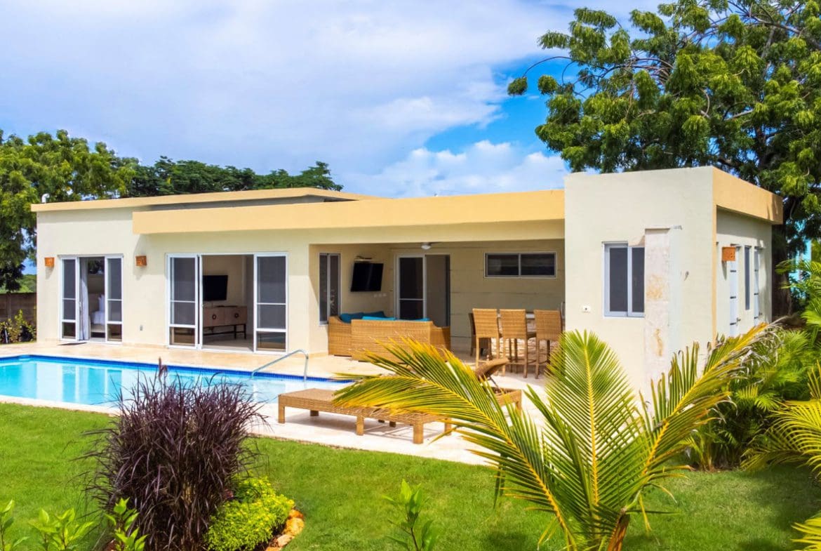 buyDRproperty Beautiful Villa CAPRI with a pool and outdoor seating area. Sosua Real Estate