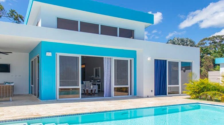 buyDRproperty Beautiful Villa SUNBREEZE with a pool and blue accents. Sosua Real Estate