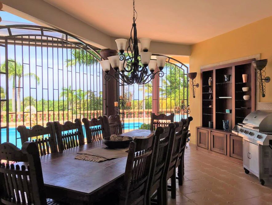buyDRproperty Elegant dining room in a beautiful 5 bedroom villa with ocean views. Sosua Real Estate