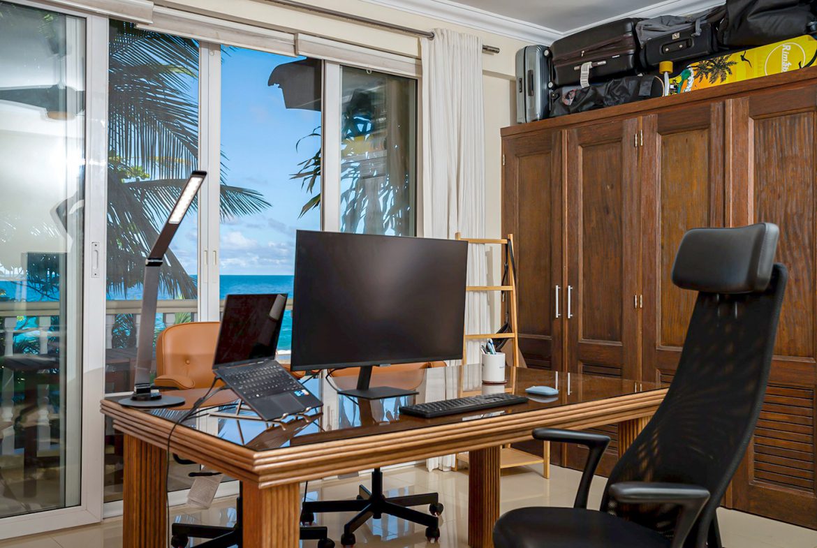buyDRproperty Home office in oceanfront condo in Sosua with a view of the ocean. Sosua Real Estate