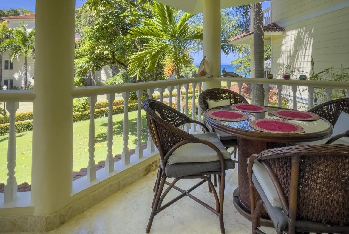 buyDRproperty Outdoor dining area of a 3 bedroom oceanfront condo with ocean view Sosua Real Estate