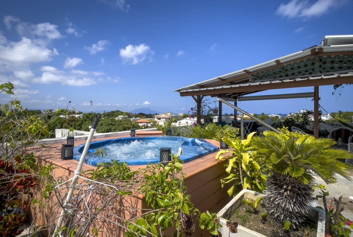 buyDRproperty Rooftop jacuzzi overlooking Sosua. 2 Bedroom Condo in the heart of Sosua. Sosua Real Estate