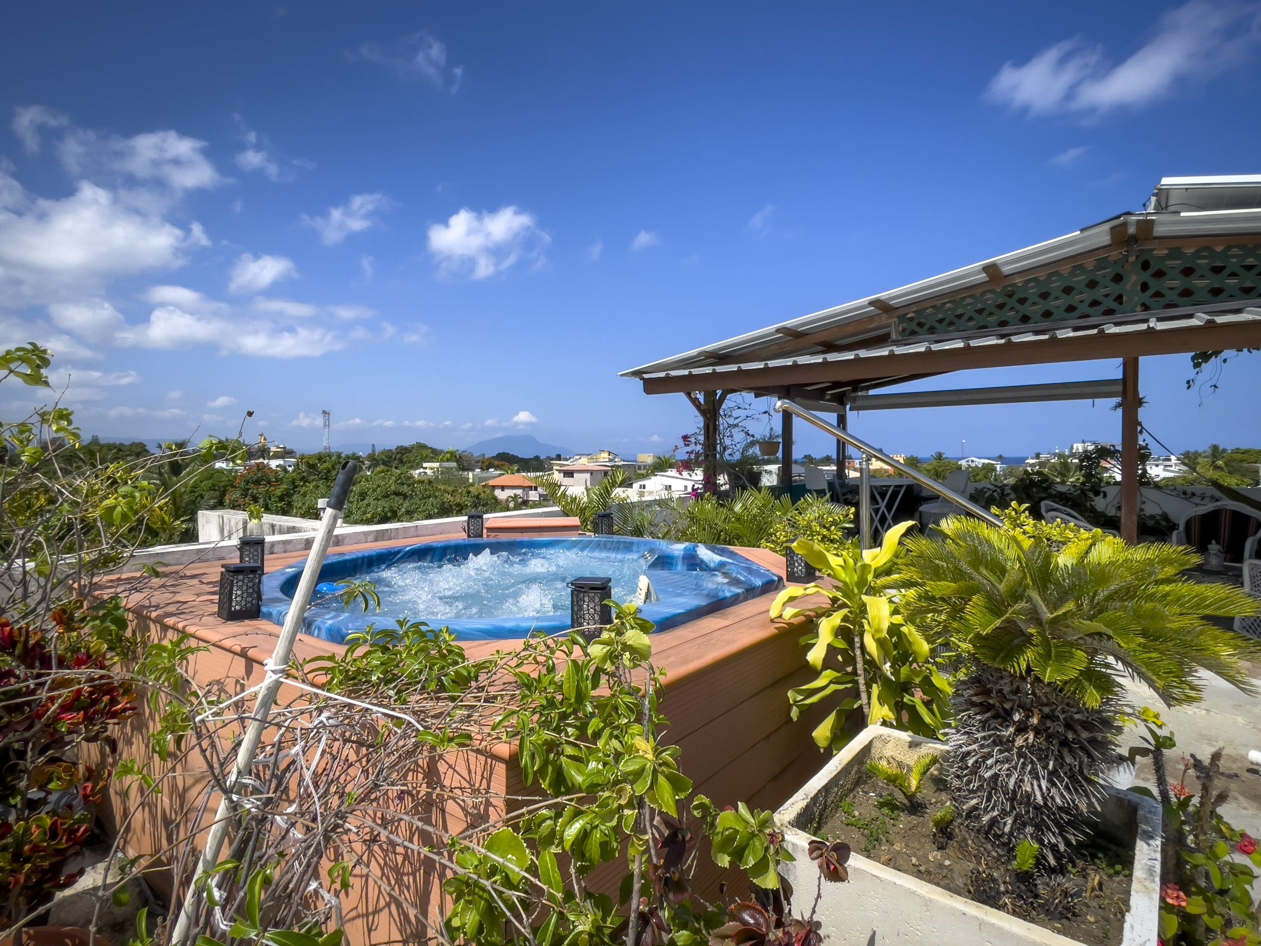 buyDRproperty Rooftop jacuzzi overlooking Sosua. 2 Bedroom Condo in the heart of Sosua. Sosua Real Estate
