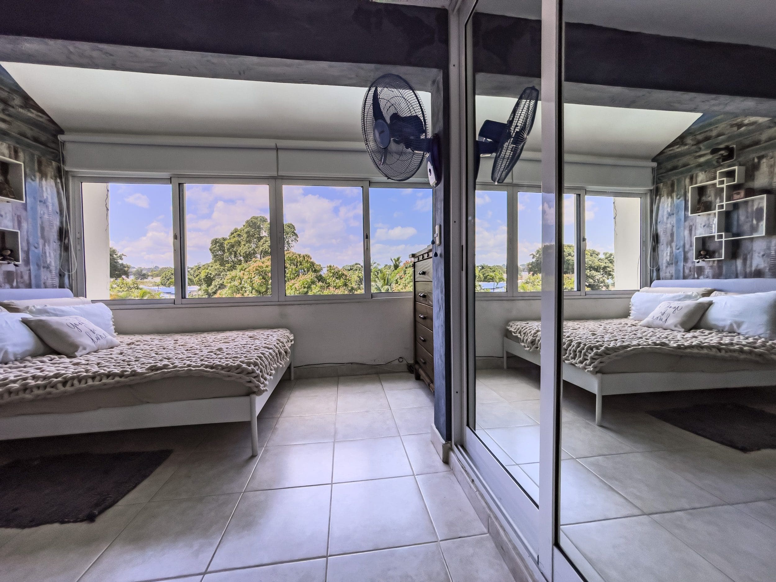 buyDRproperty Cozy bedroom in a 2 Bedroom Condo in Sosua with a view of the outdoors. Sosua Real Estate