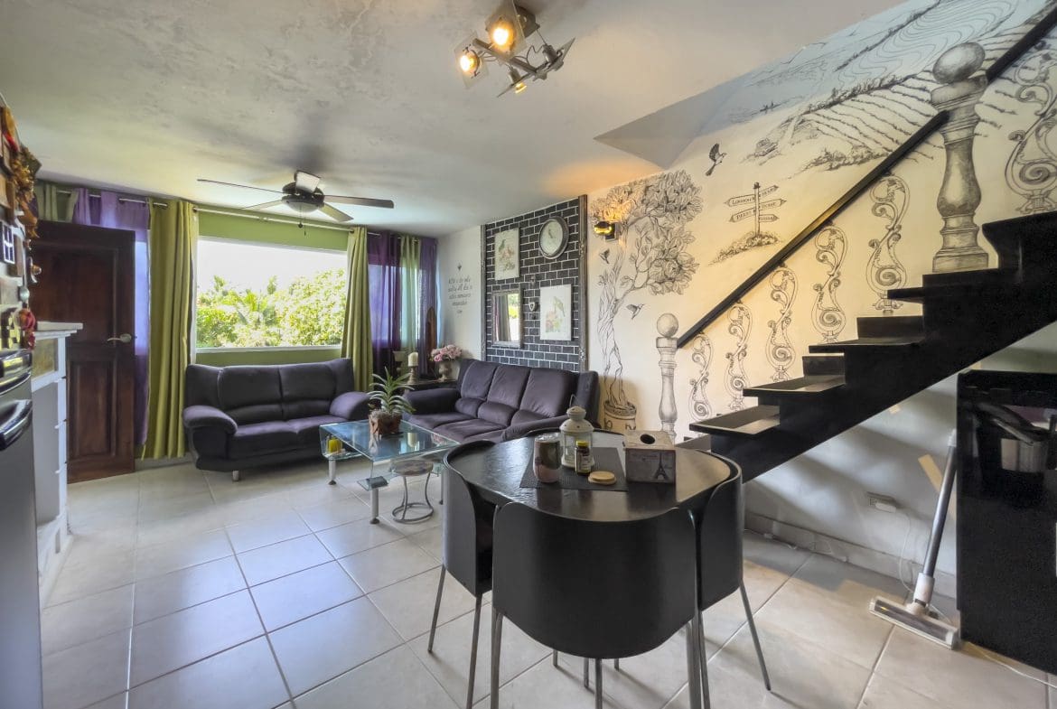 buyDRproperty Living room with a staircase in a 2 Bedroom Condo in the heart of Sosua. Sosua Real Estate