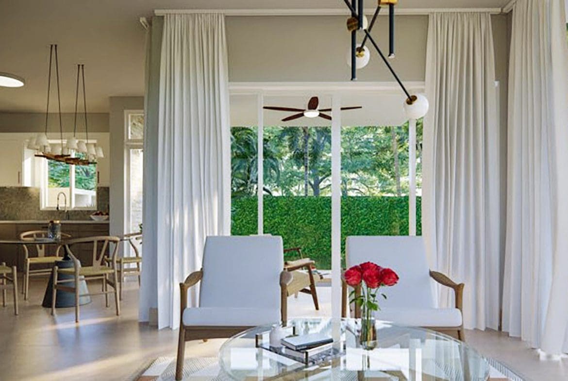 buyDRproperty Interior of a Beautiful Villa SUNSET, with white chairs and large windows. Sosua Real Estate