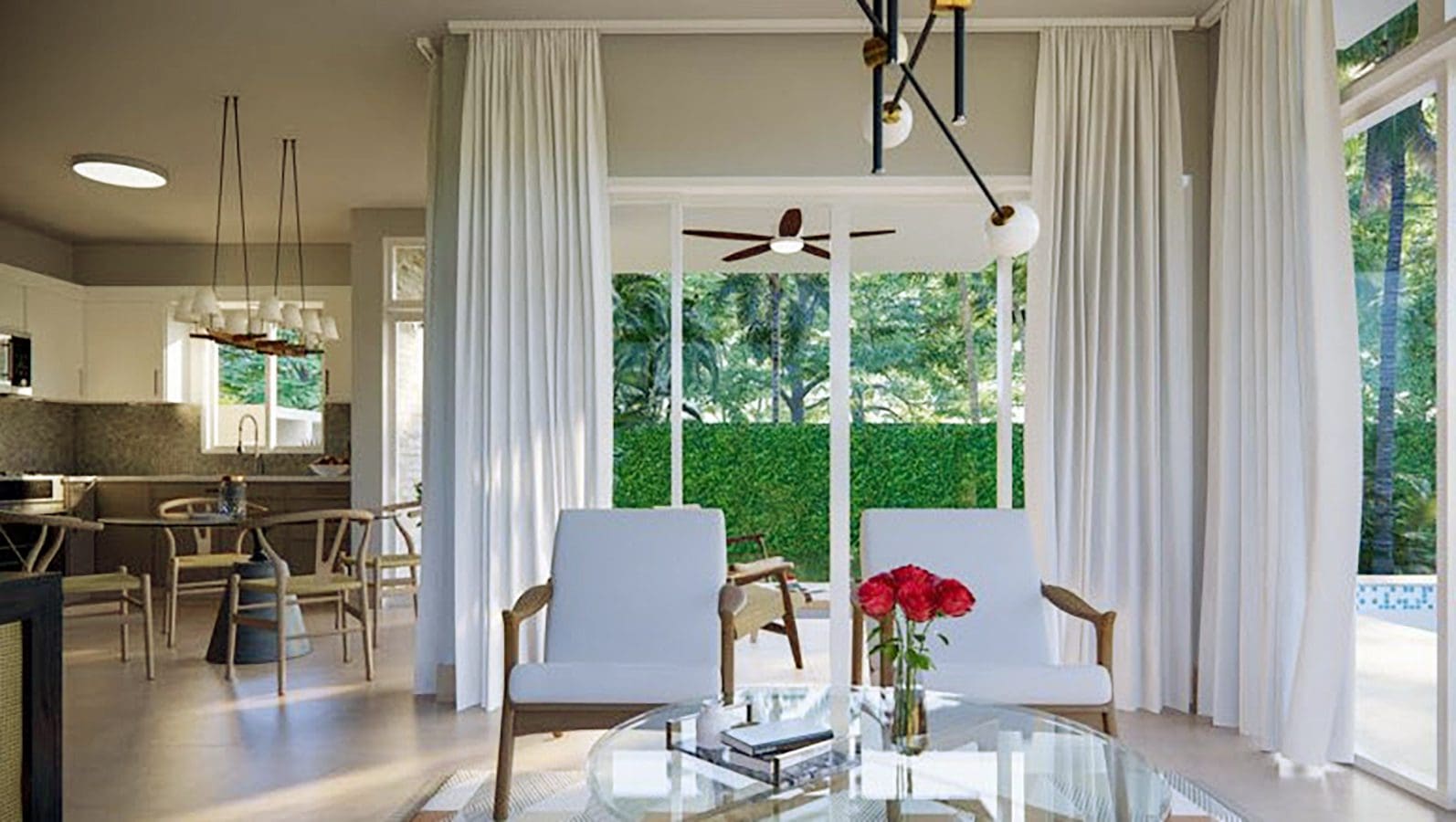 buyDRproperty Interior of a Beautiful Villa SUNSET, with white chairs and large windows. Sosua Real Estate