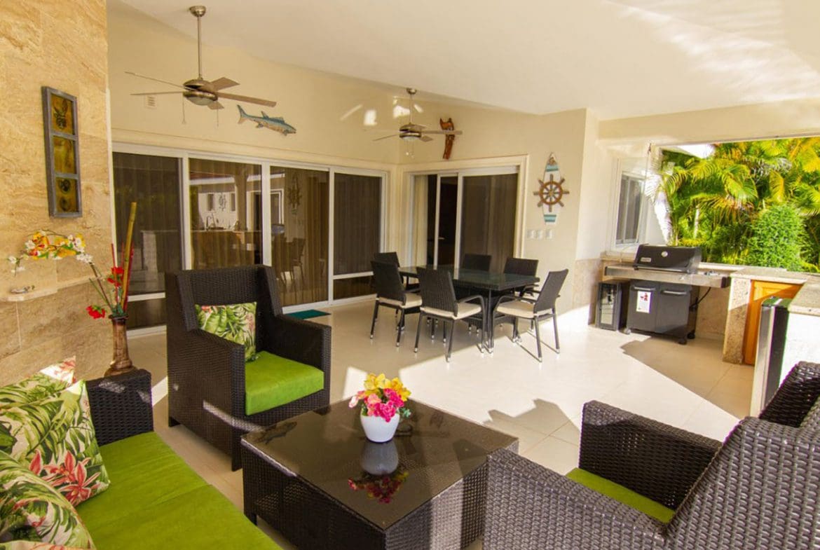 buyDRproperty Beautiful Villa BELLA outdoor patio with dining area and grill in Casa Linda. Sosua Real Estate