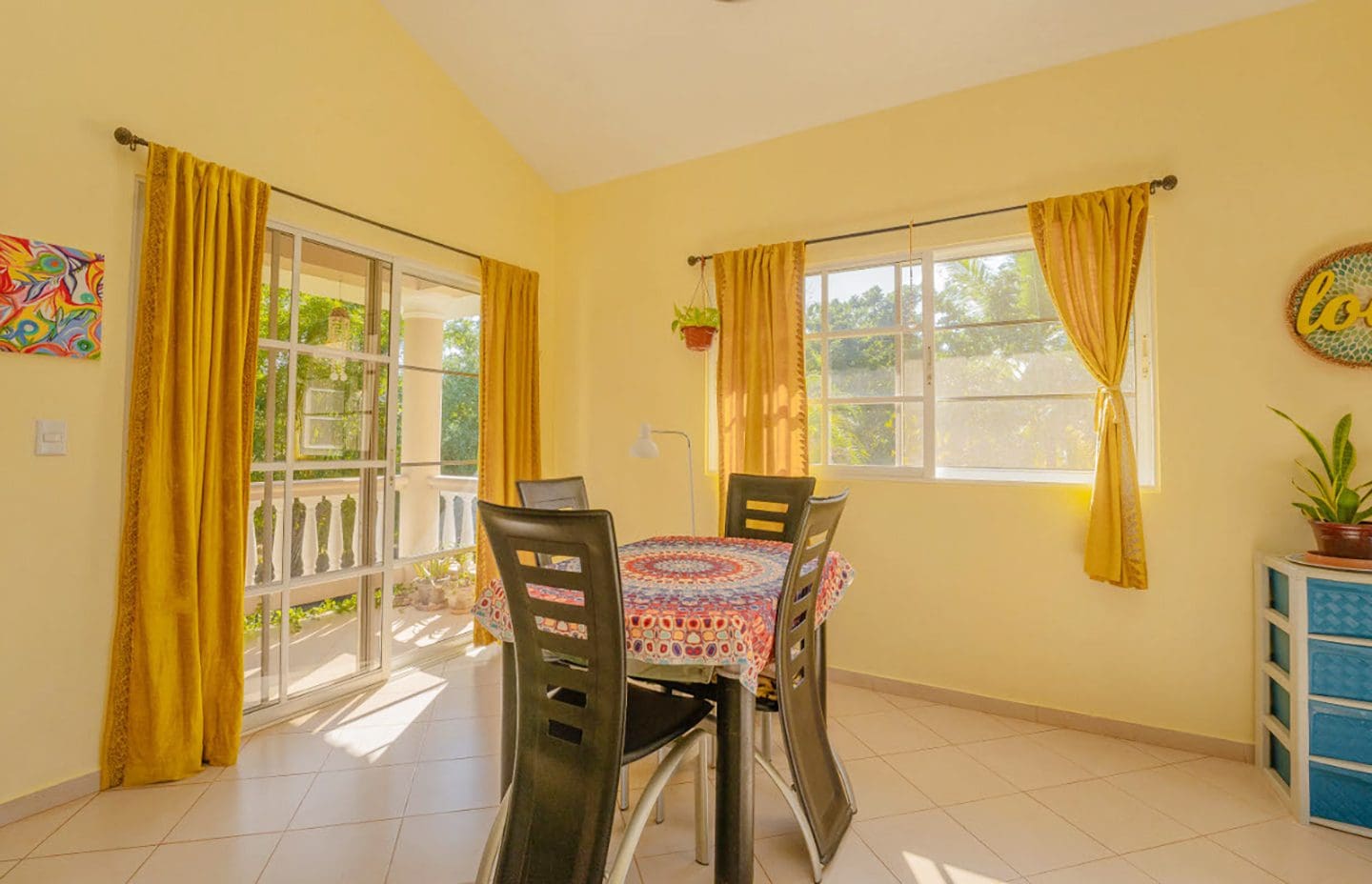 buyDRproperty Dining area in a Residential Hispaniola villa with a table and chairs. Sosua Real Estate