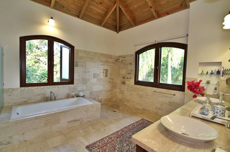 buyDRproperty Luxury bathroom in Villa CAROLINA with bathtub, shower, and double vanity. Sosua Real Estate