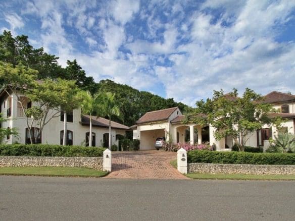 buyDRproperty Luxury Villa CAROLINA exterior with red brick driveway Sosua Real Estate