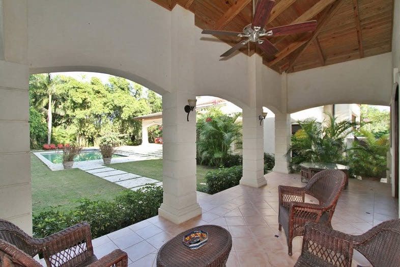 buyDRproperty Luxury patio overlooking pool at Villa CAROLINA. Sosua Real Estate