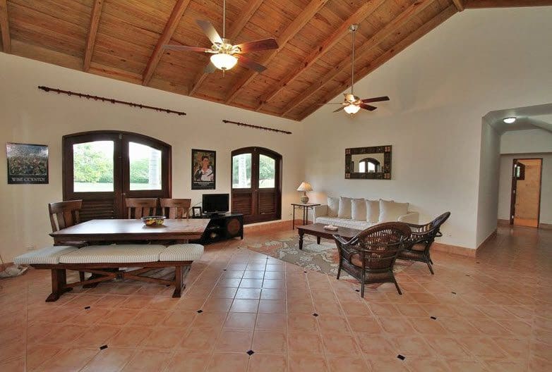 buyDRproperty Luxury villa interior with dining area and wooden ceiling Sosua Real Estate