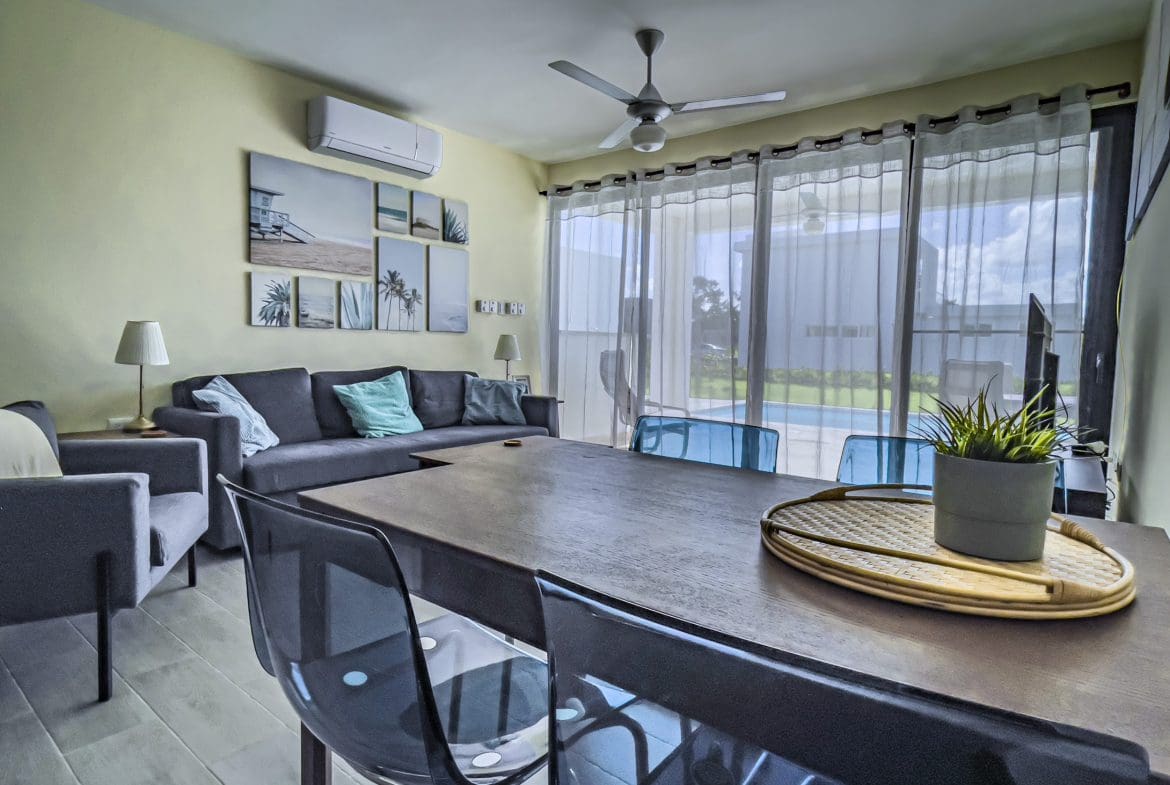 buyDRproperty Modern living room with dining area in a 2 Bedroom Villa For Sale Sosua Real Estate