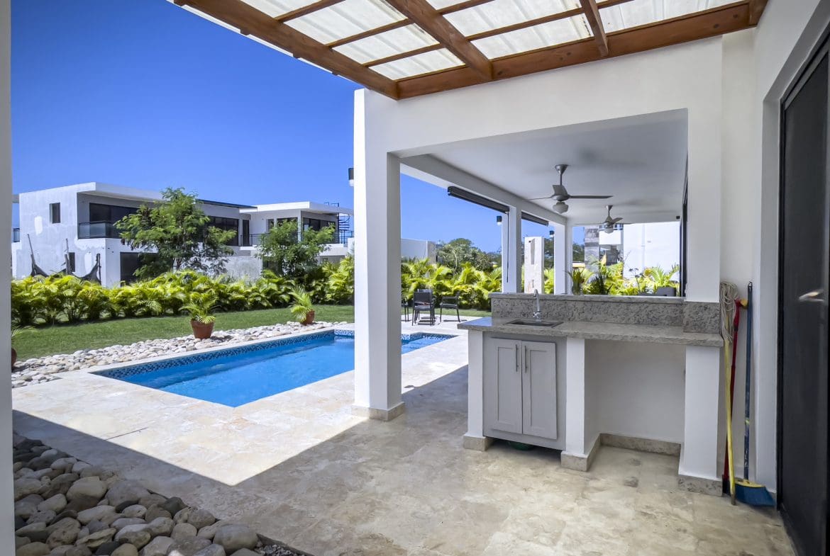 buyDRproperty Outdoor kitchen and pool at a 2 Bedroom Villa For Sale in SOV Sosua Real Estate
