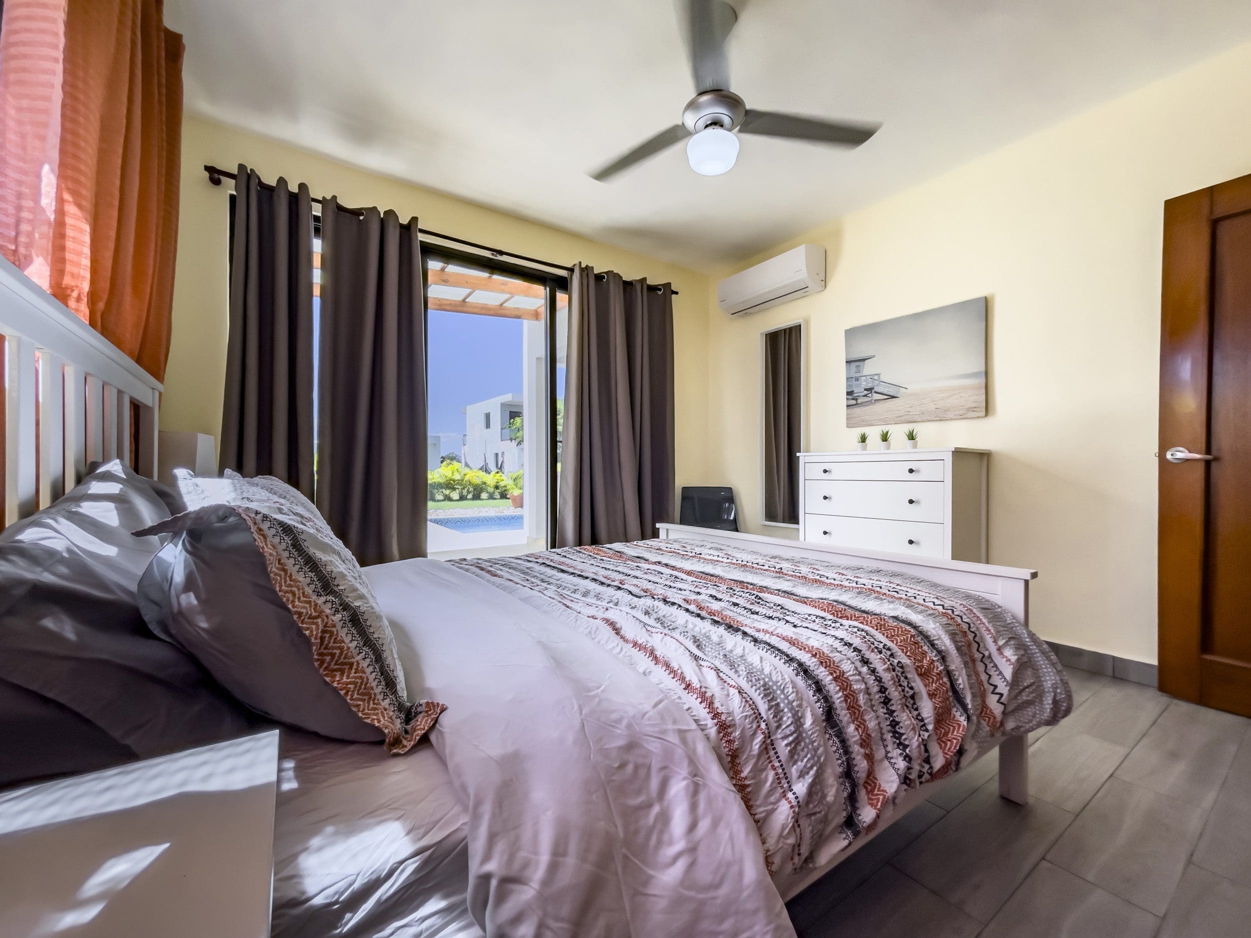 buyDRproperty Bedroom in a 2-bedroom villa for sale with a view of the pool Sosua Real Estate