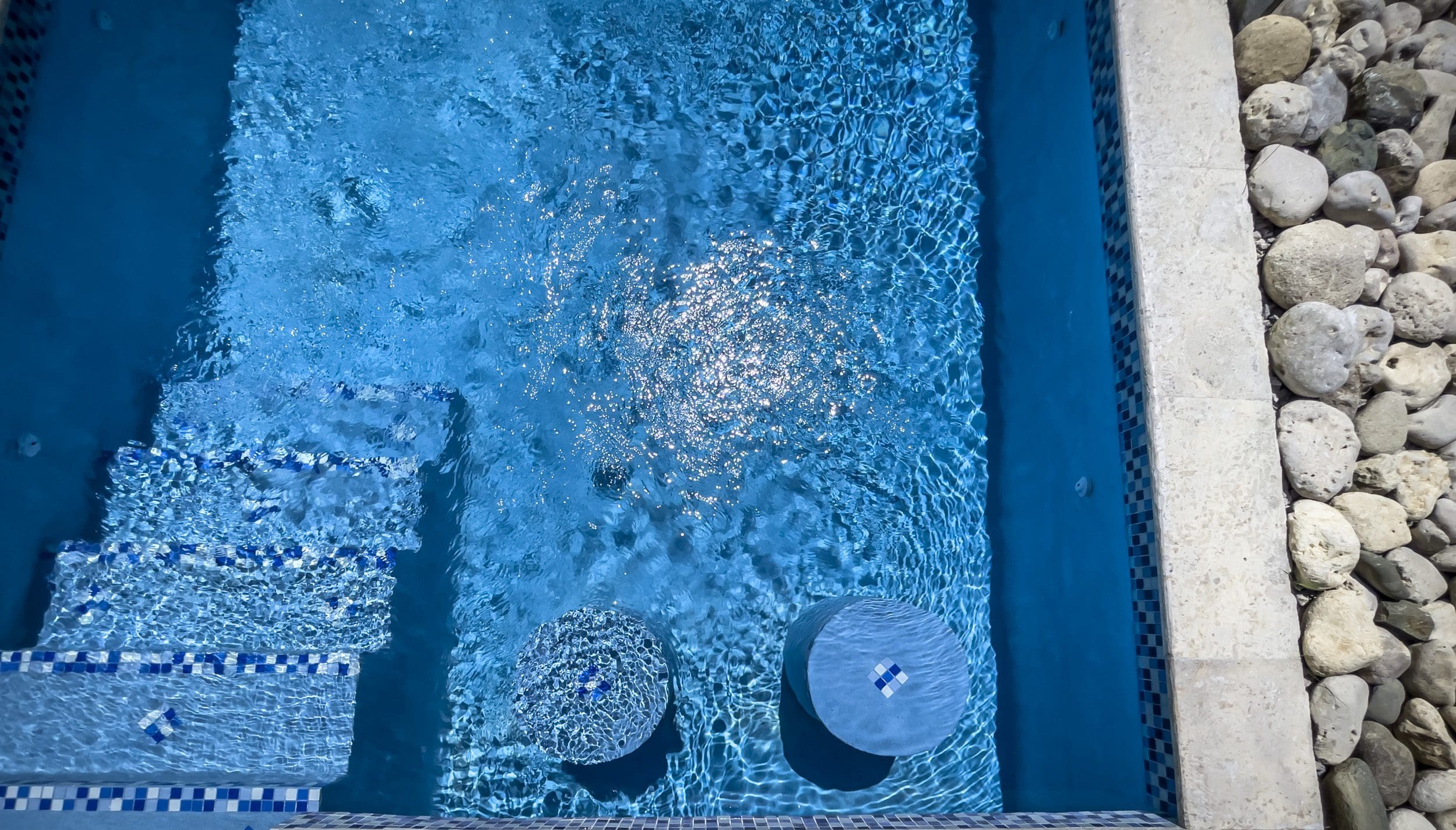 buyDRproperty Blue pool with steps and stools, perfect for a 2 Bedroom Villa For Sale. Sosua Real Estate