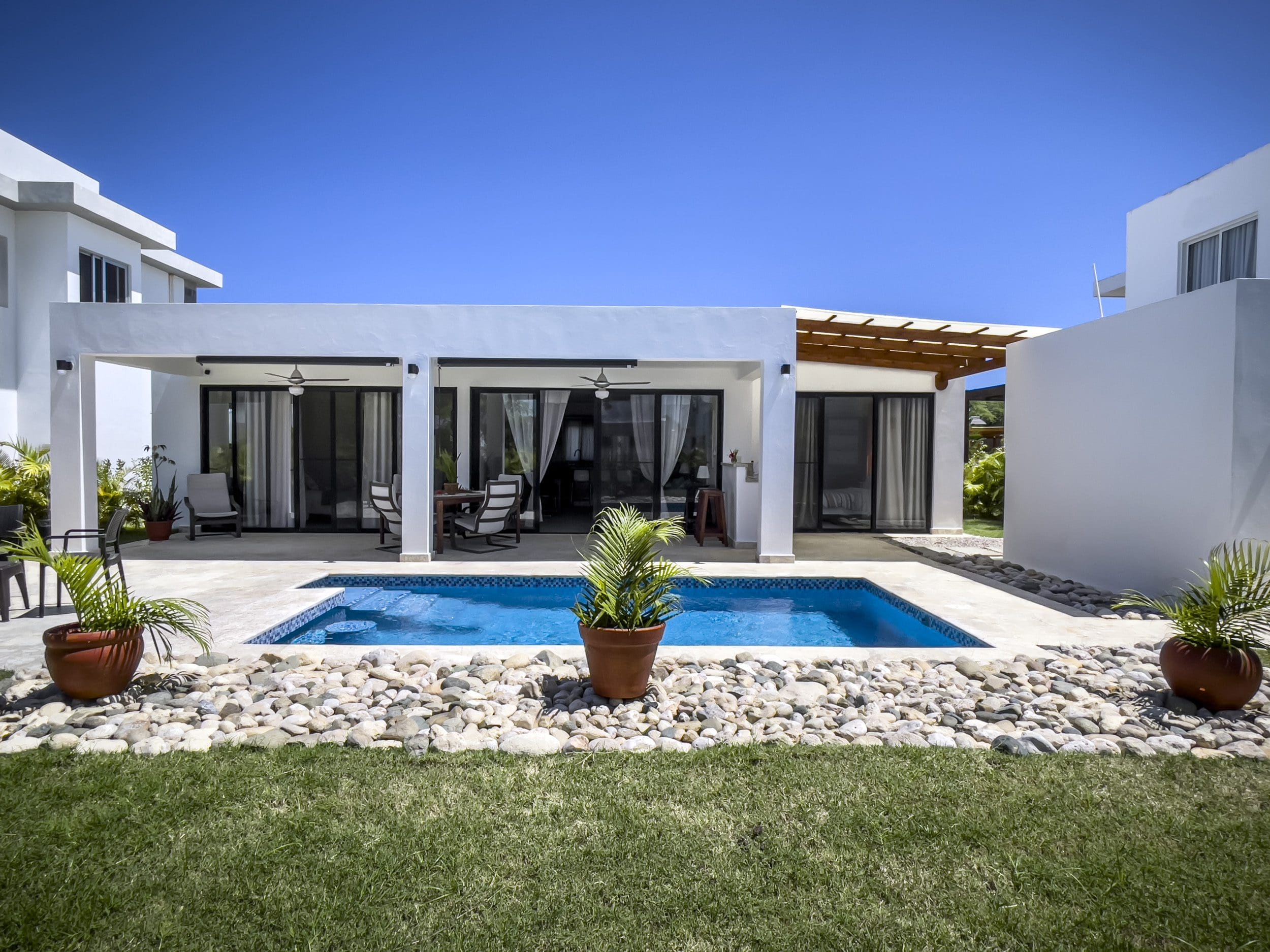 buyDRproperty 2 Bedroom Villa For Sale with pool and outdoor living space. Sosua Real Estate