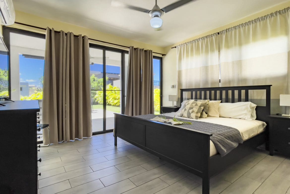 buyDRproperty Bedroom of a 2 bedroom villa for sale with a view of the backyard. Sosua Real Estate