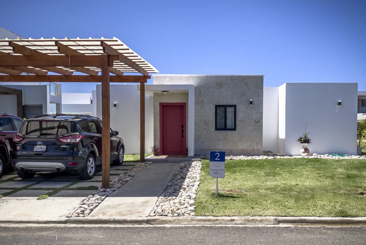 buyDRproperty Modern 2 bedroom villa for sale with red door and carport, Campo Del Mar 3 Sosua Real Estate
