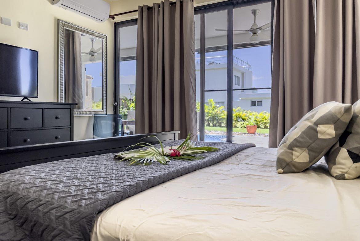 buyDRproperty Bedroom in a 2 Bedroom Villa For Sale with pool view. Sosua Real Estate