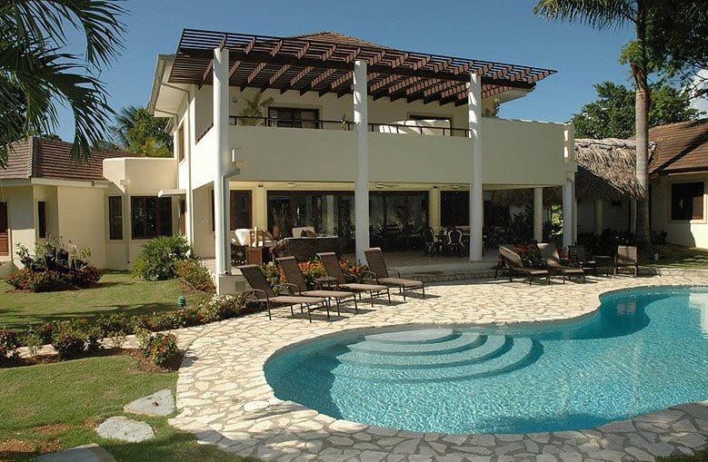 buyDRproperty Exterior view of Beautiful VILLA BRILLANTE with a pool and patio Sosua Real Estate