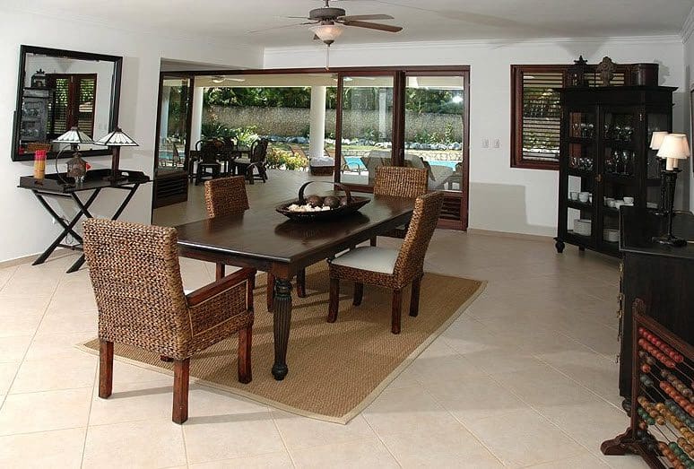 buyDRproperty Dining area in Beautiful VILLA BRILLANTE with woven chairs and a view. Sosua Real Estate